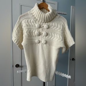 Bebe turtle neck short sleeve sweater. Like New!